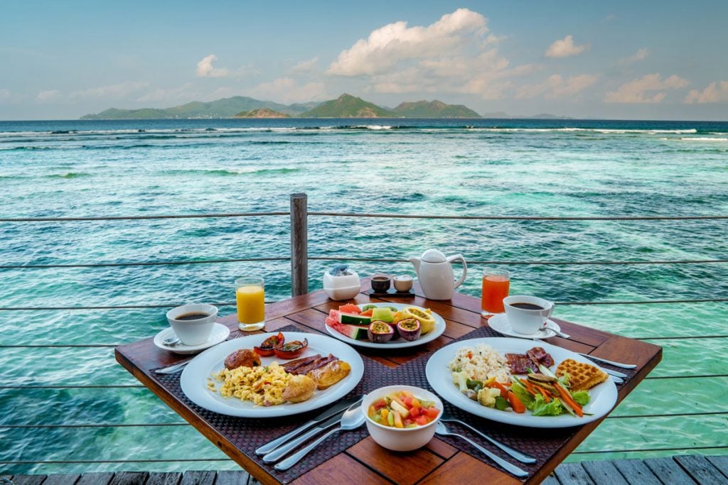 luxury breakfast with a look at the ocean of La Digue Seychelles By Fokke