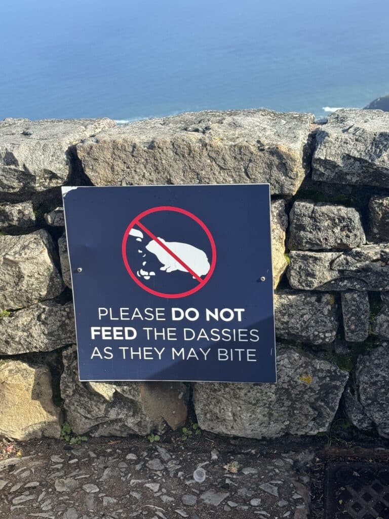 Table Mountain wildlife safety sign highlighting the natural side of luxury travel in Cape Town